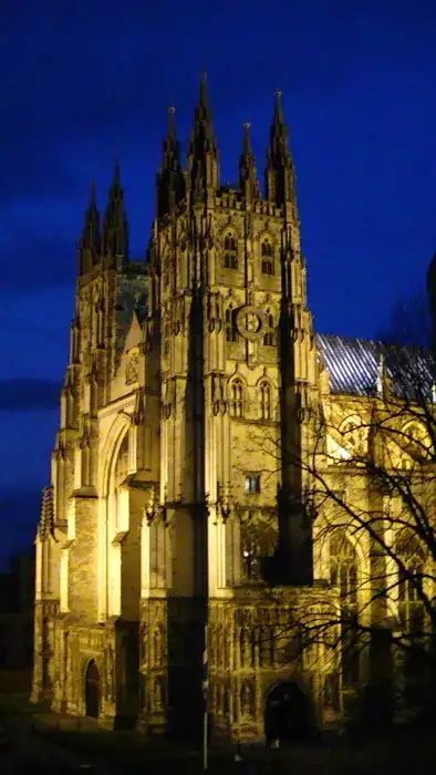 Canterbury Cathedral illuminated at dusk, photographed in April 2012; archive city setting, not the 2026 Christmas market