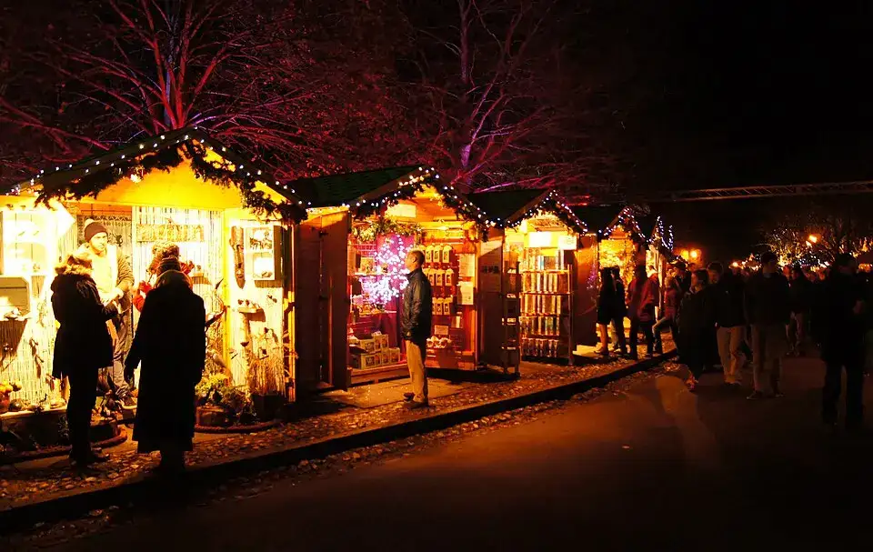 After dark scene at Winchester Cathedral Christmas Market (geograph 4278751)