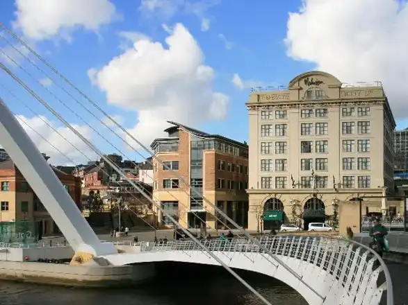 Malmaison Hotel, Newcastle Quayside The Malmaison Hotel on Newcastle's Quayside in the shadow of the Gateshead Millennium Bridge. Converted from the former Co-operative Wholesale Society warehouse the Malmaison is reputed to be the oldest surviving large-scale ferro-concrete building in the UK