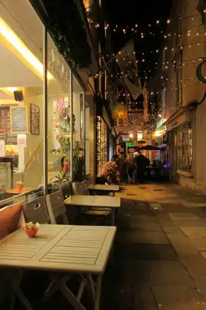 Fairy lights above New Bond Street Place in Bath at night in 2019