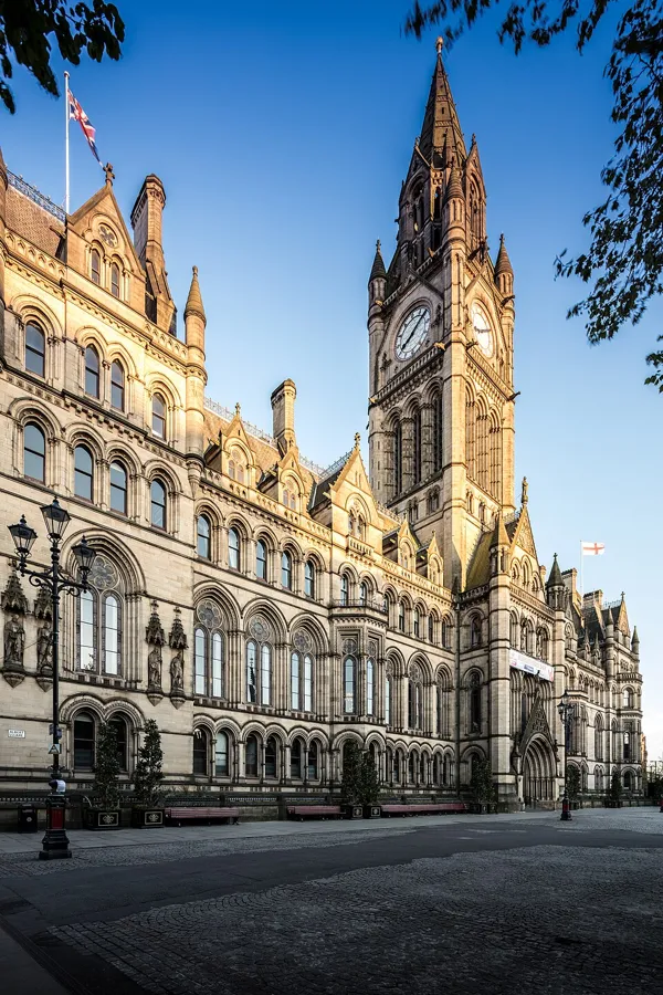 Manchester Town Hall clock tower and Gothic façade beside Albert Square