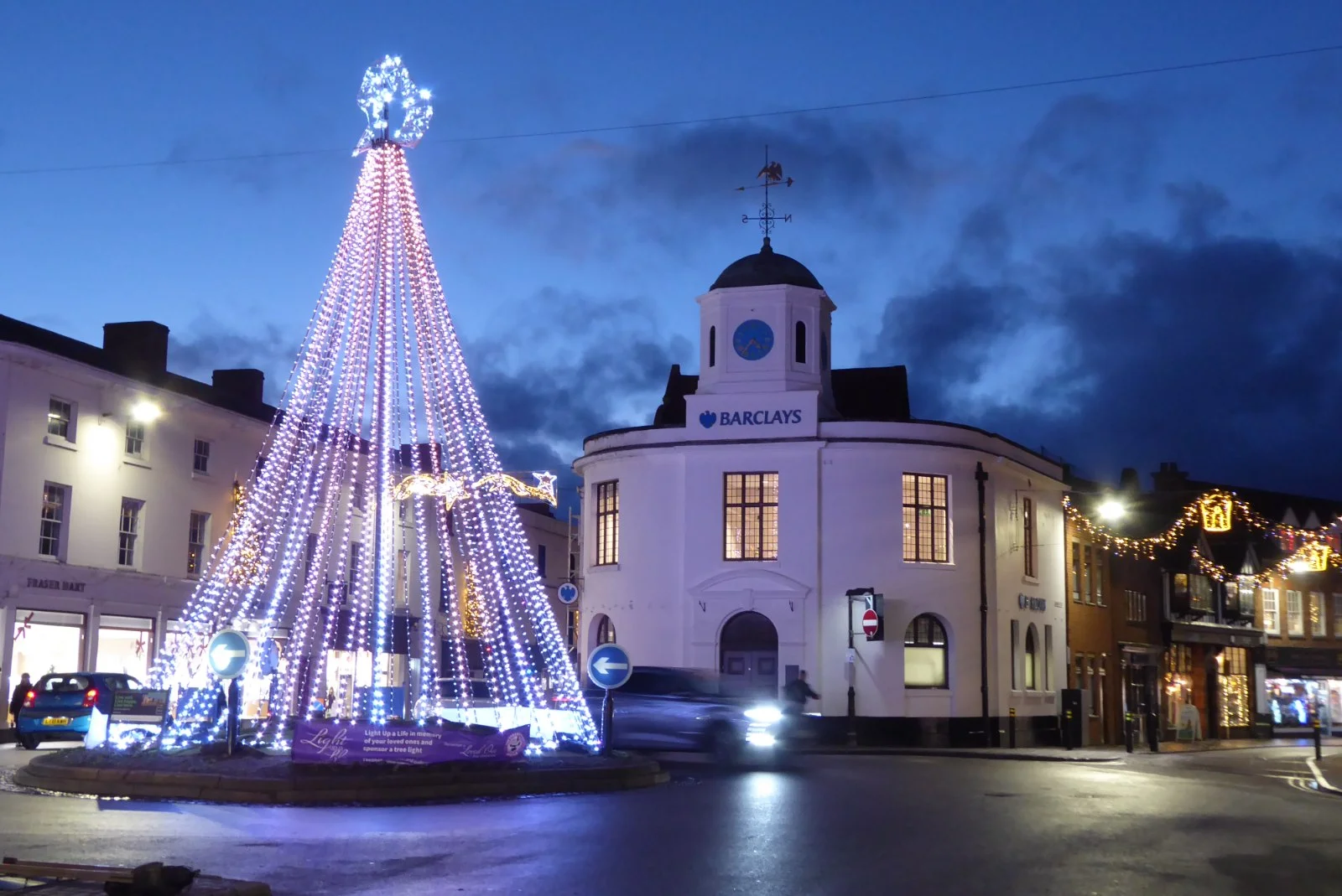 Christmas lights and illuminated tree on Bridge Street in Stratford-upon-Avon, photographed in a previous season.